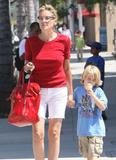 th_01466_sharon_stone_goes_sans_makeup_for_ice_cream_with_her_son4_122_1066lo.jpg
