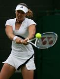 http://img103.imagevenue.com/loc16/th_28779_Martina_Hingis_2006_Wimbledon_Championships__Day_One_01.jpg