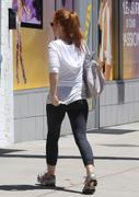 Isla Fisher - booty in tights leaving a gym in Studio City 08/16/13