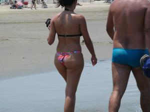 Tanned White Girl with Fantastic Round Meaty Butt Strolls on Tiny Bikini t4h4fr9r4d.jpg